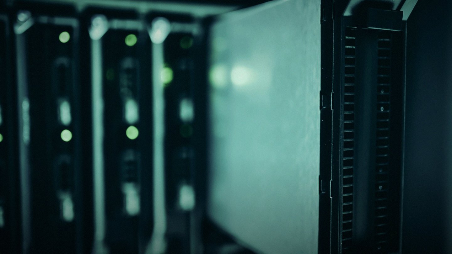 A server rack lit in green inside a Nigerian data centre
