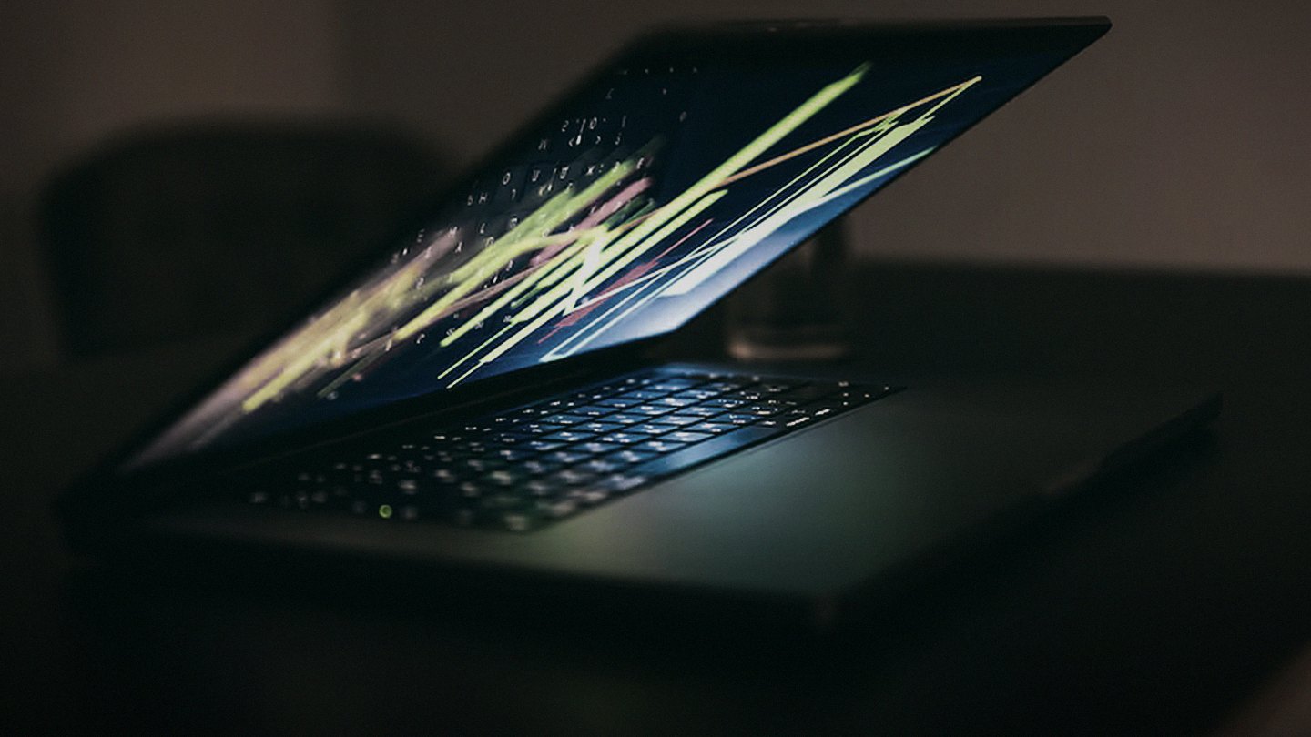 A laptop rendering light, the smallest unit of owned compute